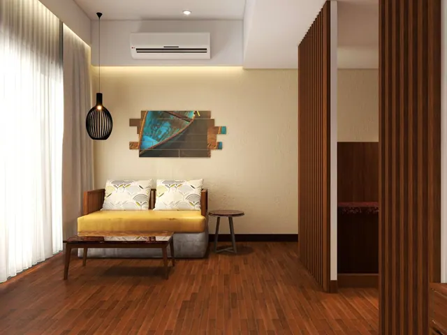 A bright living area contains a sofa, coffee table, pendant lamp, air conditioner and built-in wooden storage.